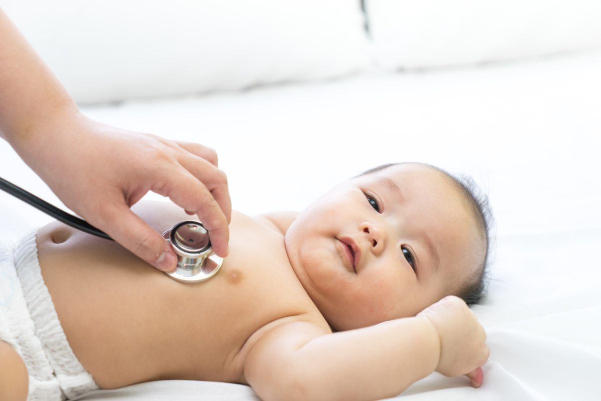 Doctor exams Asian newborn baby with stethoscope in the hospitalDoctor exams Asian newborn baby with stethoscope in the hospital
